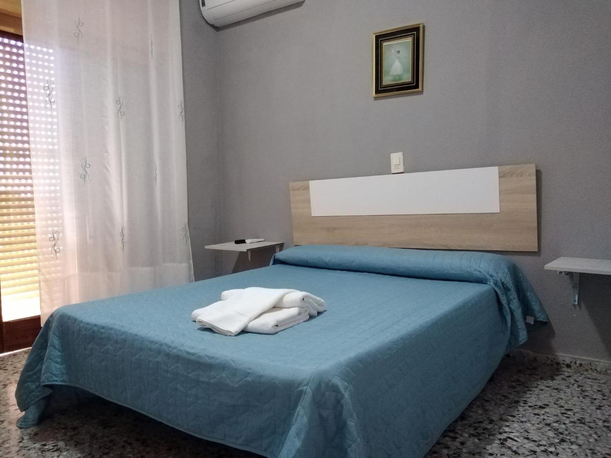 Vacansis Habitaciones De Hostal A Primera Linea De Playa En Cullera Esterno foto